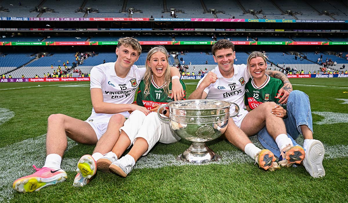 Mayo players Kobe McDonald, left, and Jordan Flynn with their partners Leah Meheady, second from left, and Jessie Brown, after the GAA Football All-Ireland Senior Championship final match between Kerry and Mayo at Croke Park in Dublin. Pic: Seb Daly/Sportsfile