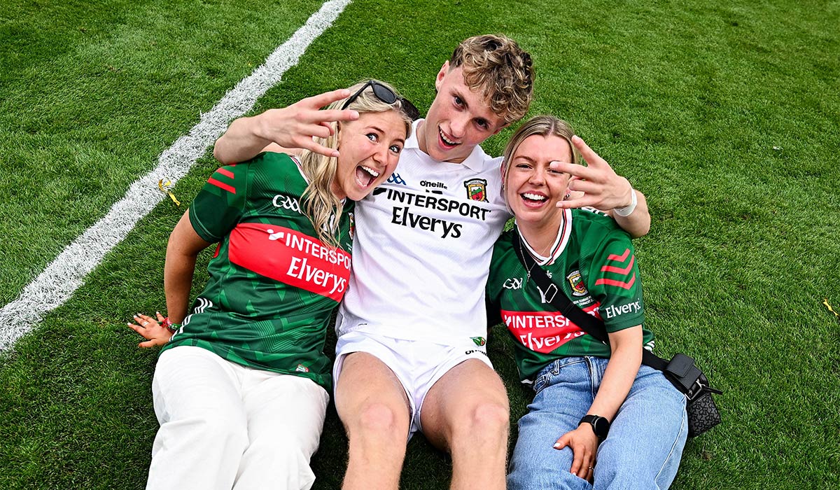 Kobe McDonald of Mayo with partner Leah Maheady, left, and Jessie Brown, fiancé of Mayo player Jordan Flynn after the GAA Football All-Ireland Senior Championship final match between Kerry and Mayo at Croke Park in Dublin. Pic: David Fitzgerald/Sportsfile