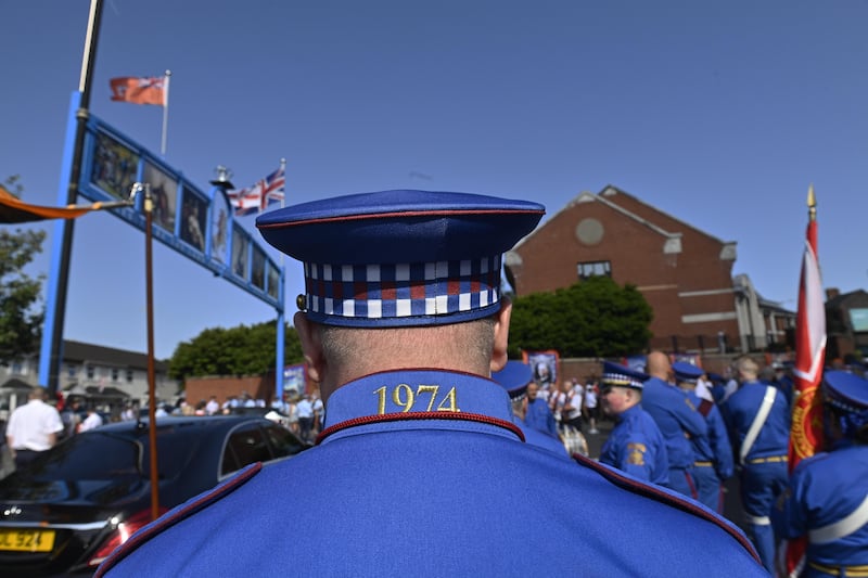 Band members and members of the Orange Order prepare to parade on the streets in Belfast. Photo: EPA/Shutterstock