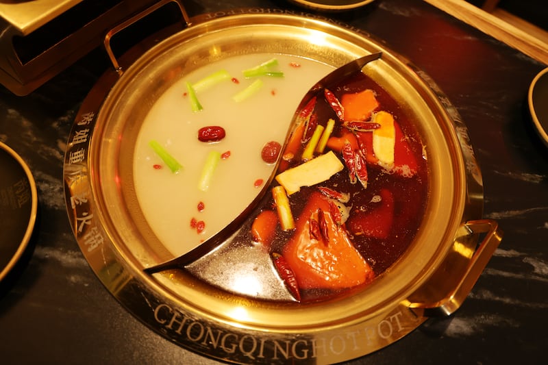Dual hotpot at Chongqing Hotpot. Photograph: Bryan O'Brien