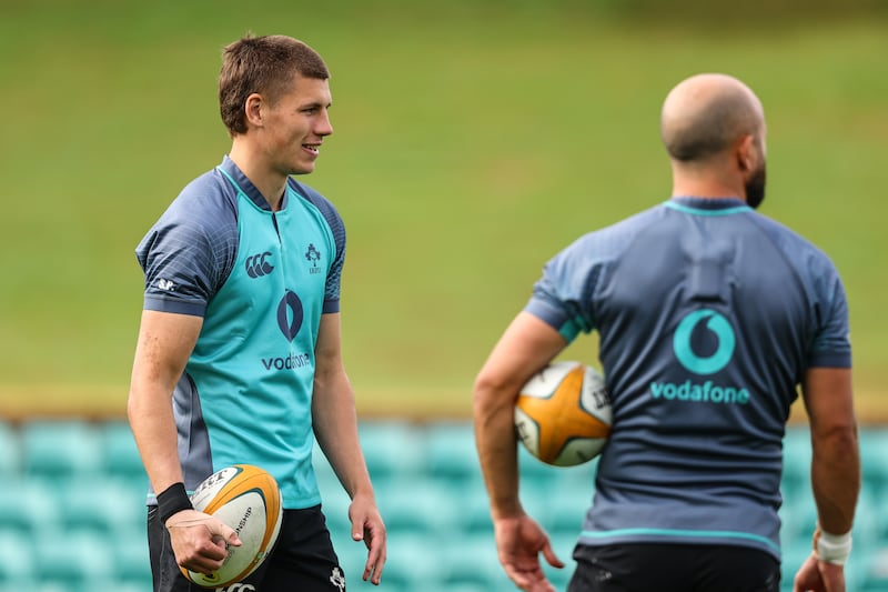 Sam Prendergast (left) training with the Ireland squad in Sydney ahead of Saturday's Nations Championship opener against Australia. Photograph: Ben Brady/Inpho
