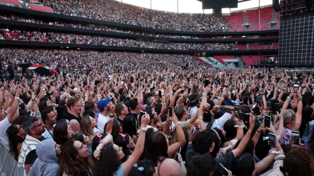 Fans cheer during the concert of US singer-songwriter Taylor Swift at Luz Stadium in Lisbon, Portugal, 24 May 2024