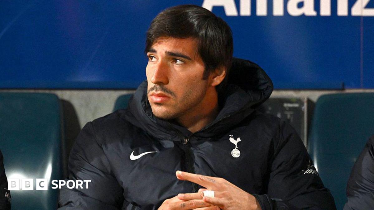 Sandro Tonali looking off to the left on the bench for Spurs during pre-season