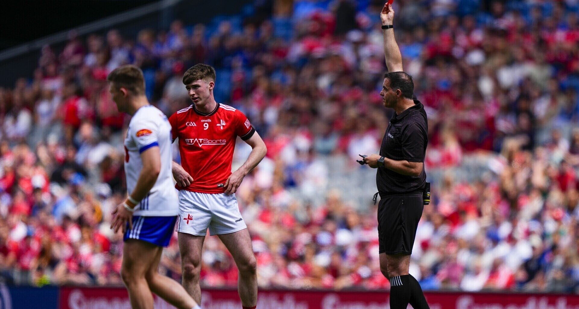 Seán Hurson gives a red card to Sean Callaghan of Louth. Pic: James Lawlor/Inpho