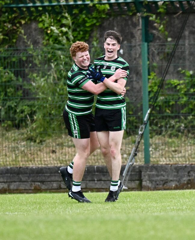  (right) Douglas Goal scorer Adam Kelly is congratulated by teammate Ciaran Fitzgerald for in the Rebel Og Fe18 Premier 1 League Football final: Douglas vs Carrigaline at Ballinlough, Cork. Picture: Larry Cummins