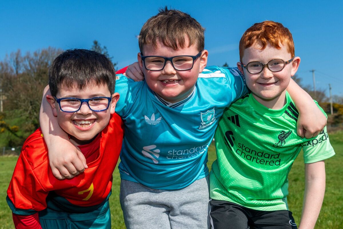 First class pupils in Enniskeane, Darragh McCarthy, Joseph Ryan, and James Hayes, taking part in the jersey day in March as part of the Stand 4 Féile fundraising drive. Picture: Andy Gibson