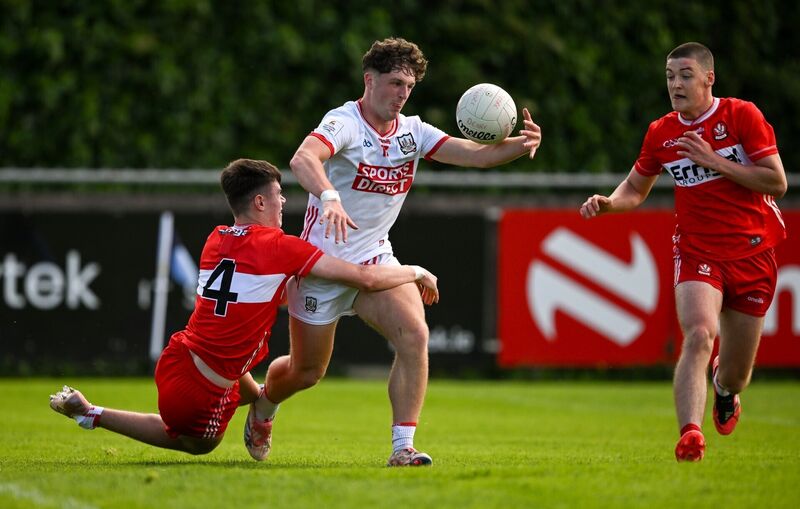 Tom Whooley of Cork in action against Dara McKaigue and Conor Sargent of Derry. Picture: Sam Barnes/Sportsfile