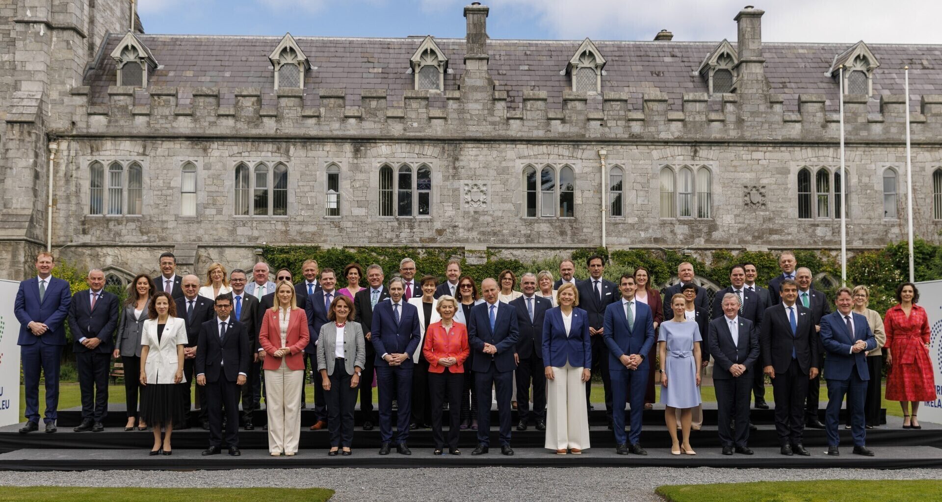 Tánaiste Simon Harris (front row,centre left), Taoiseach Micheál Martin (front row, centre right) and European Commission president Ursula von der Leyen (front row, centre) pose for a family photo with government ministers and the 27 EU commissioners at University College Cork as Ireland begins its presidency of the EU Council. Picture: Liam McBurney/PA