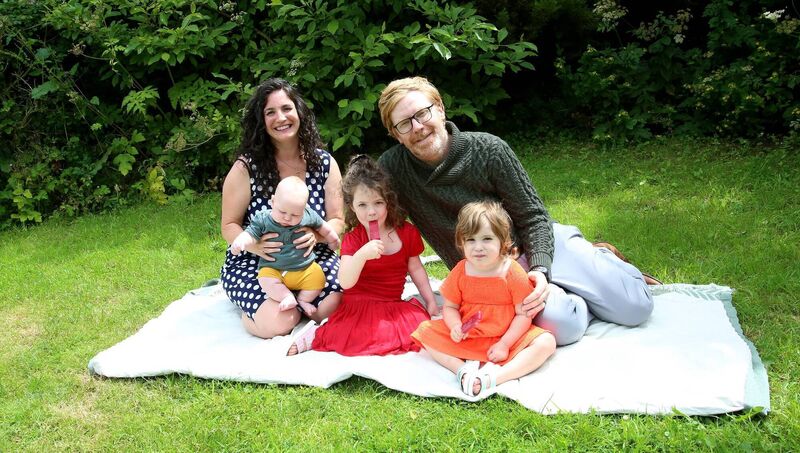 Jillian and Robbie Molloy with their children Matthé, Áine Niamh, and Aoise. Jillian, who lives with an auto-immune disease, sought out information on free births while taking a doula training course after her condition led to a crisis of faith in the system. Picture: Paul Molloy.
