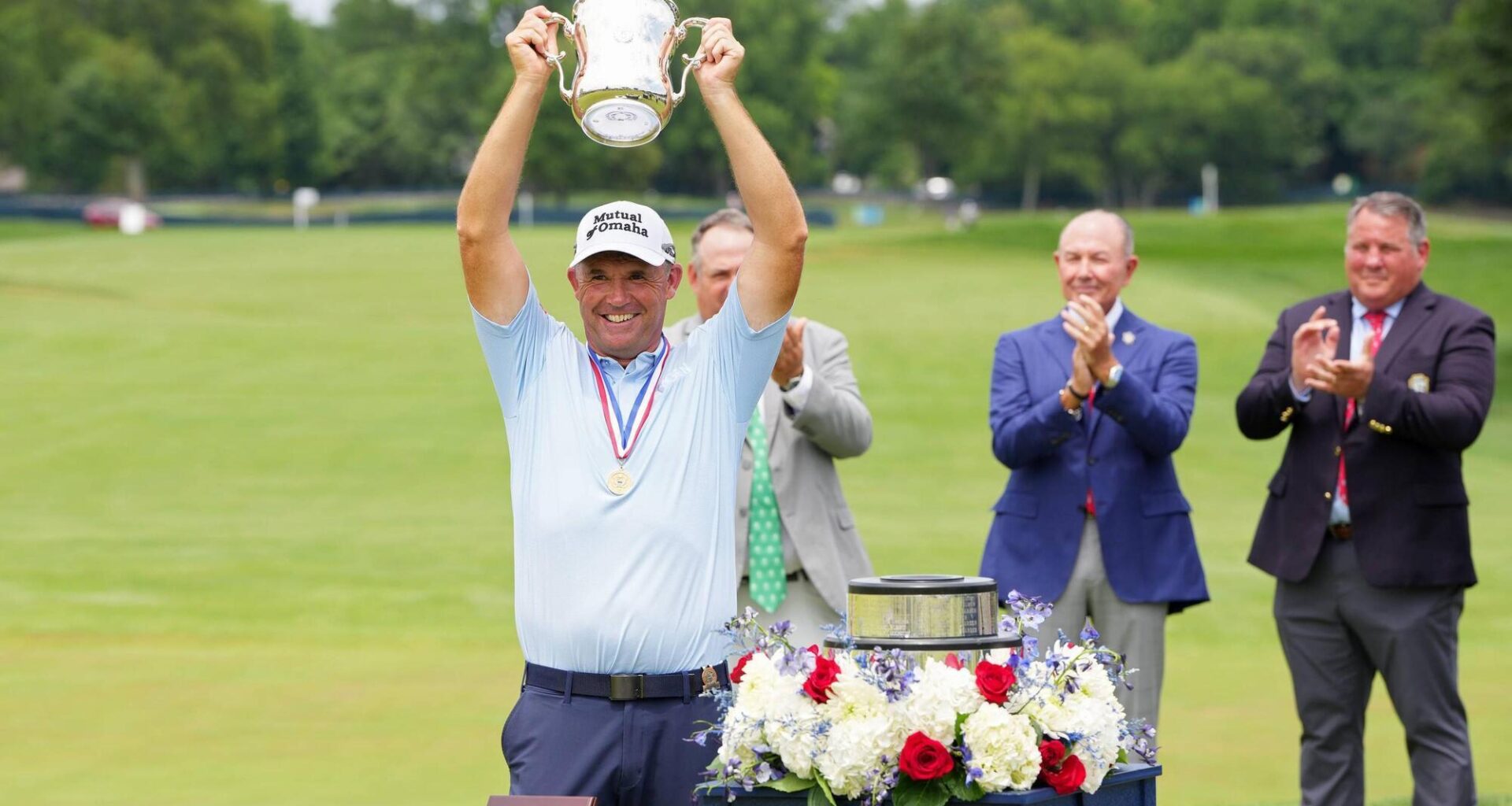 WINNER WINNER: Padraig Harrington raises aloft the Francis D. Ouimet Memorial Trophy after winning the US Senior Open Championship at Scioto Country Club in Columbus, Ohio. Pic: Dylan Buell/Getty Images