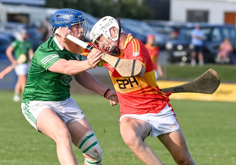  Jack Casey of Éire Óg is tackled by Killeagh's Alex Howey during their U18 Premier 2 Hurling League final at Carrigtwohill. Picture: David Keane.