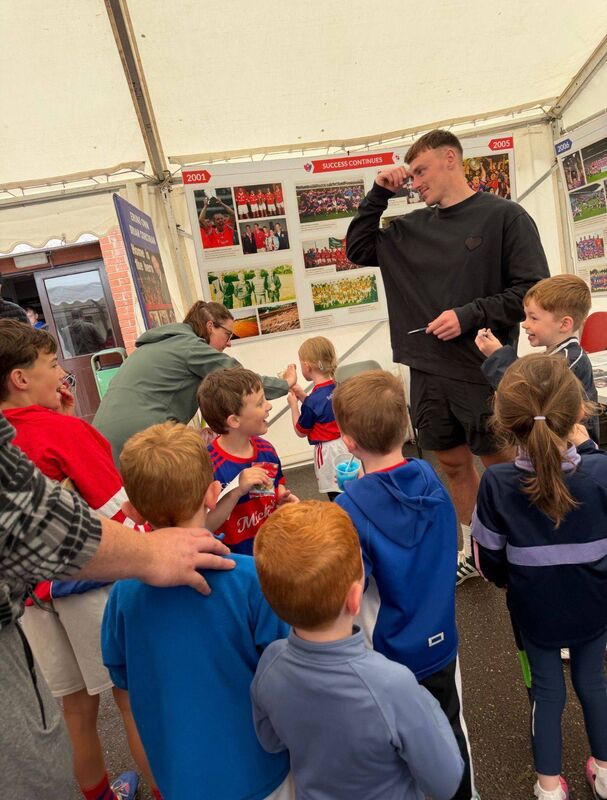 Erin's Own youngsters meeting their inter-county hero Robbie O'Flynn.