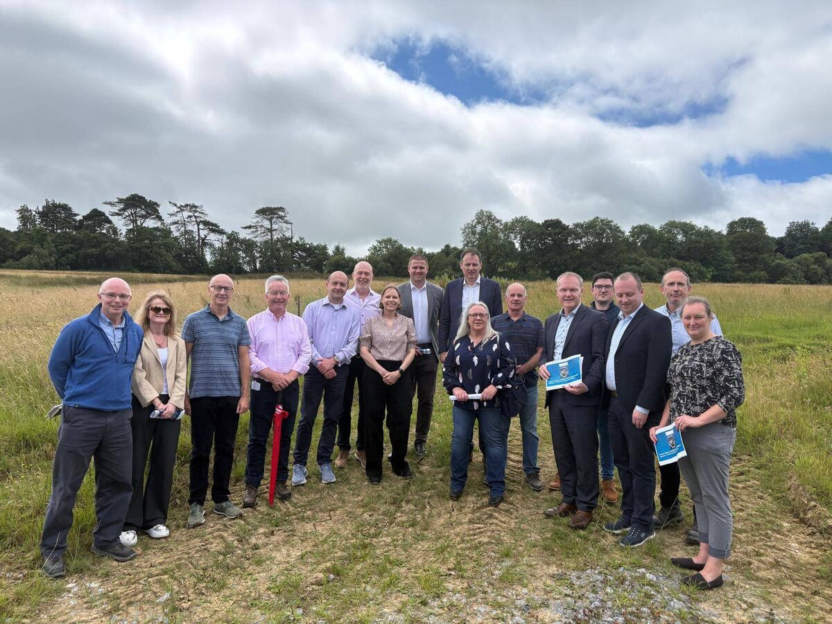 Representatives from local sporting organisations, the Carrigaline Community Sports Campus group, Cork County Council, and Carrigaline Order of Malta, with Seamus McGrath TD and Minister of State at the Department of Culture, Communications and Sport, Charlie McConalogue, during the minister’s visit to the Kilnagleary site.