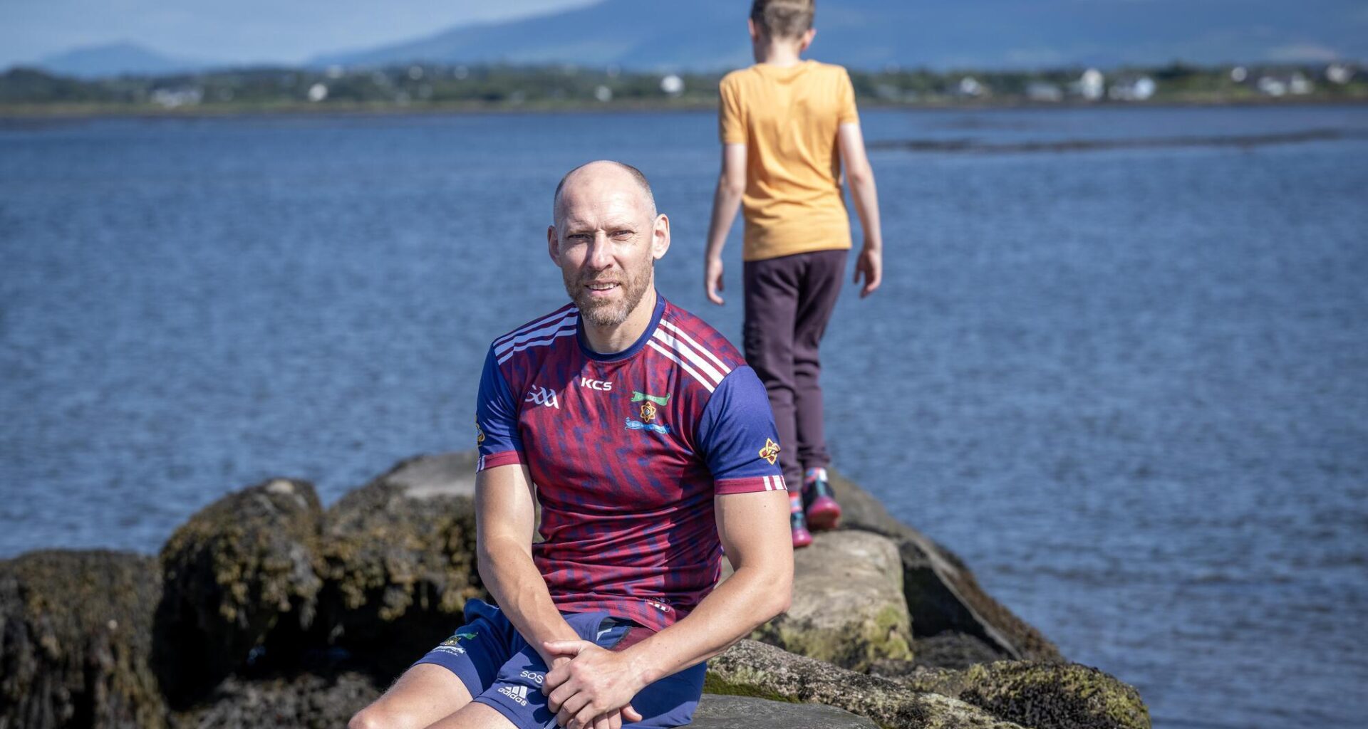 Former Kerry footballer Sean O'Sullivan from Cromane with his 11-year-old son Dylan walking on Cromane beach in South Kerry. Photo: Domnick Walsh  