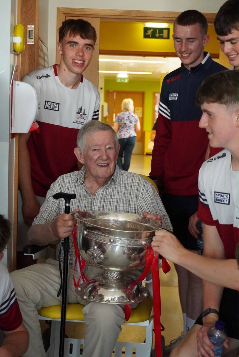 The sight of the trophies — and the energy of a young team still buzzing from their achievement — brought smiles. Picture: Max Ricken