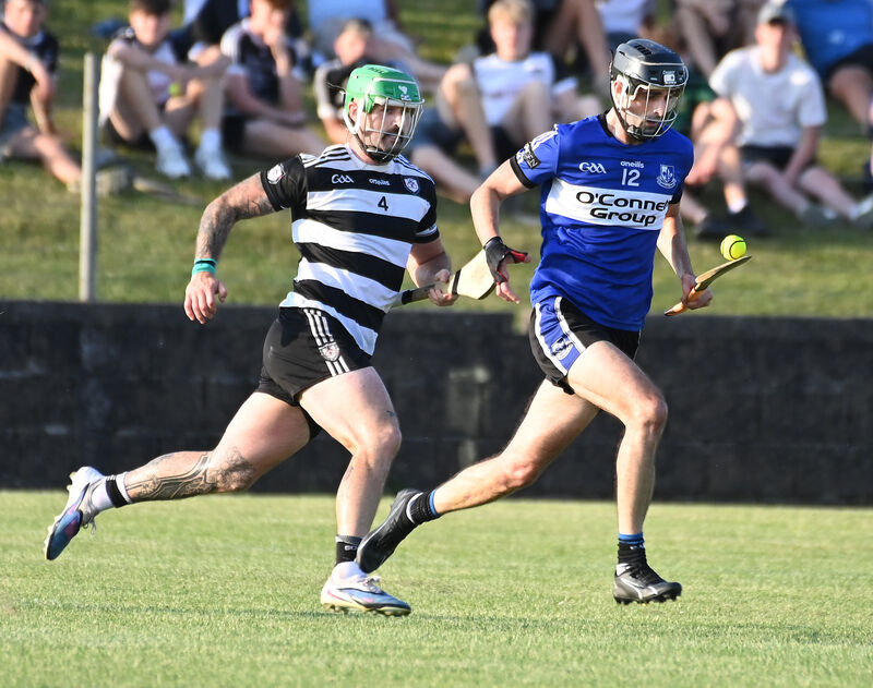 Sarsfields' Luke Hackett breaks from Midleton's Luke Dineen. Picture: Eddie O'Hare