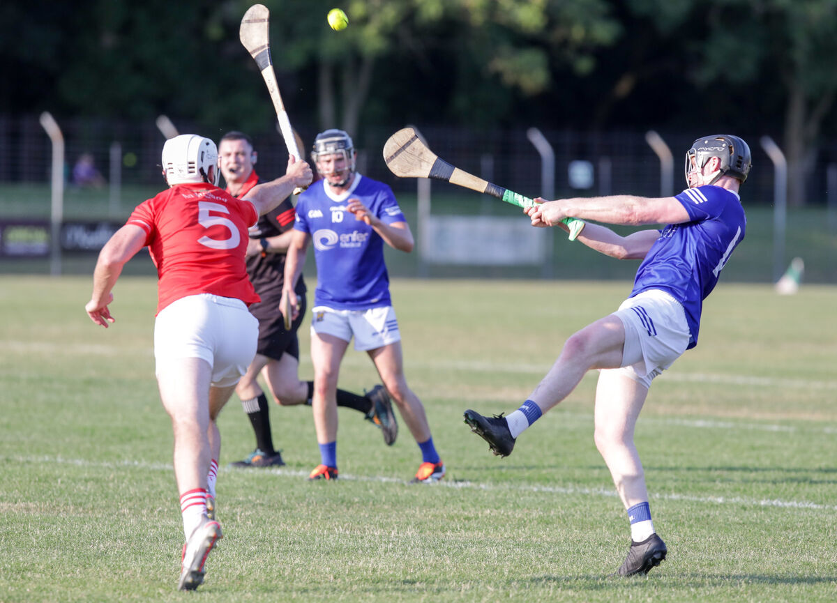 Ballinhassig's Ger Collins shoots over Blarney's Olan Hegarty. Picture: David Creedon