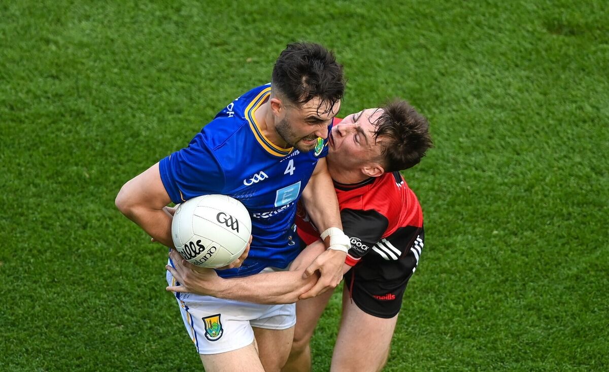 Wicklow's Malachy Stone in action against Down's Ceilum Doherty. Pic: Stephen McCarthy/Sportsfile