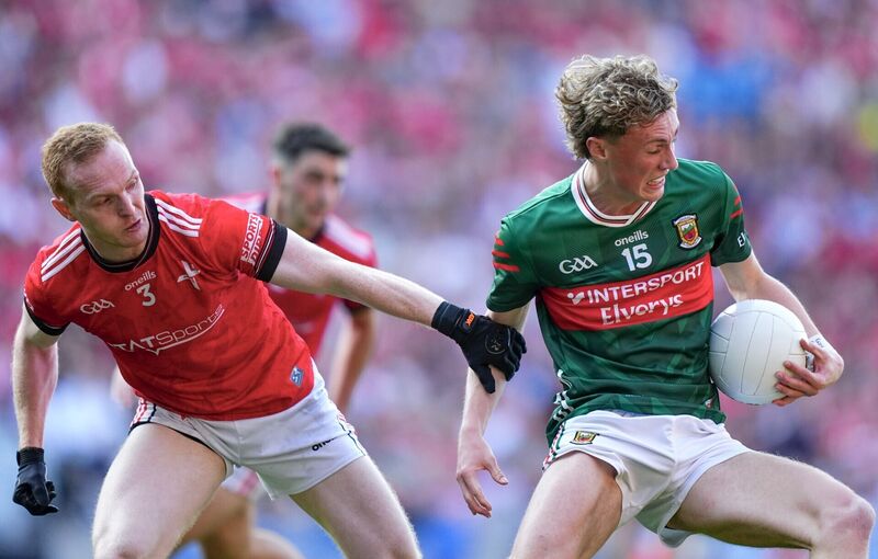 Kobe McDonald turns Louth's Donal McKenny. Pic: James Lawlor/Inpho
