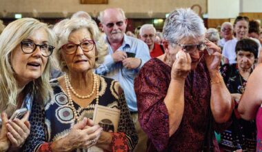 One member of the congregation wipes away a tear during the emotional final Mass at St Augustine’s Church in Cork. The church officially seats 1,200, but one priest estimated the congregation spilling out into Washington Stand the Grand Parade was close to 2,000. Pictures: Chani Anderson