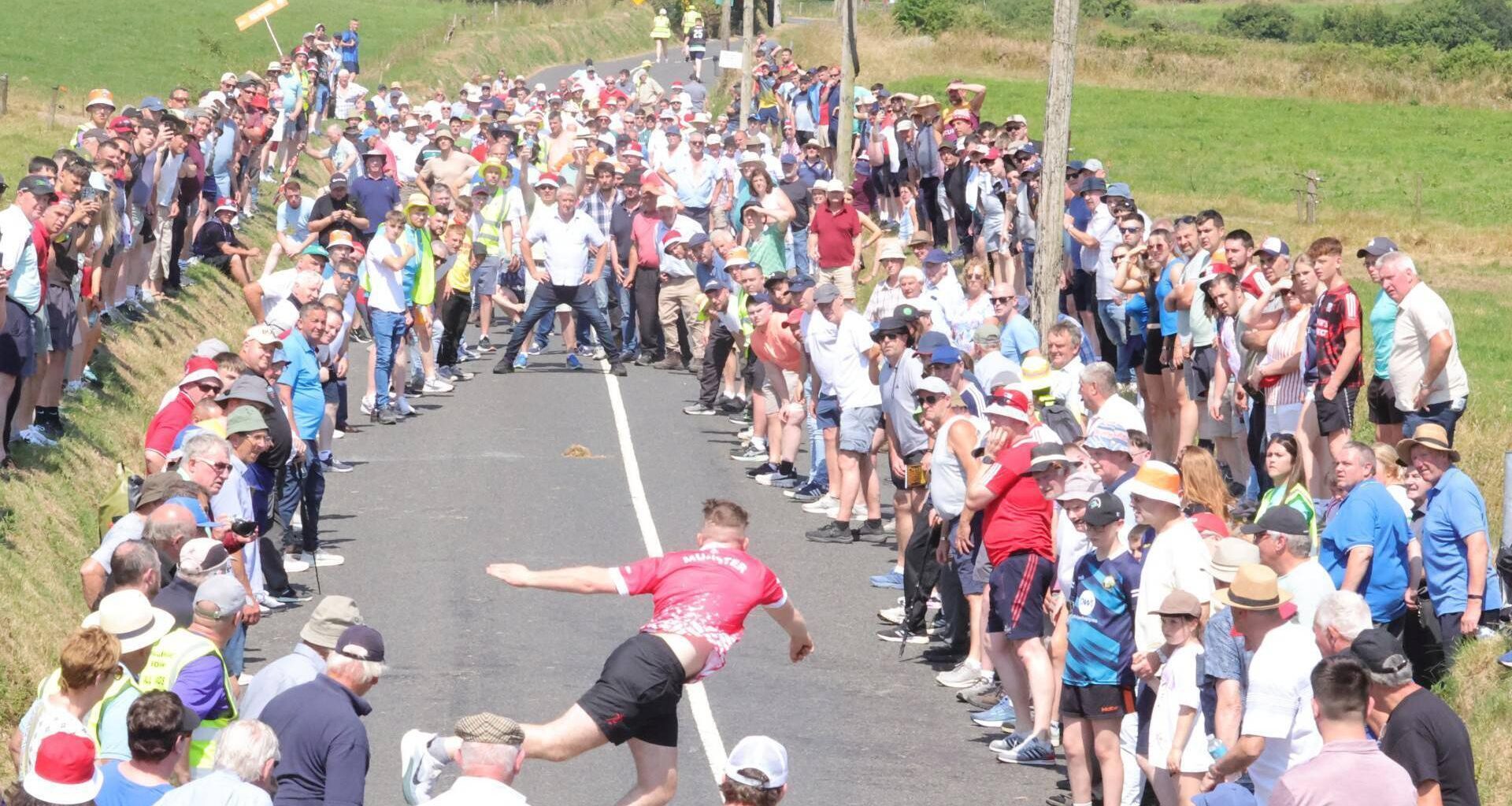 CROWD CONTROL: Munster junior A champion, Darragh Dempsey sends the bowl over the sop towards his father Noel in the All-Ireland final last weekend in Ballinagree, Co. Cork. Pic: Greta Cormican championships in Ballinagree, Co Cork