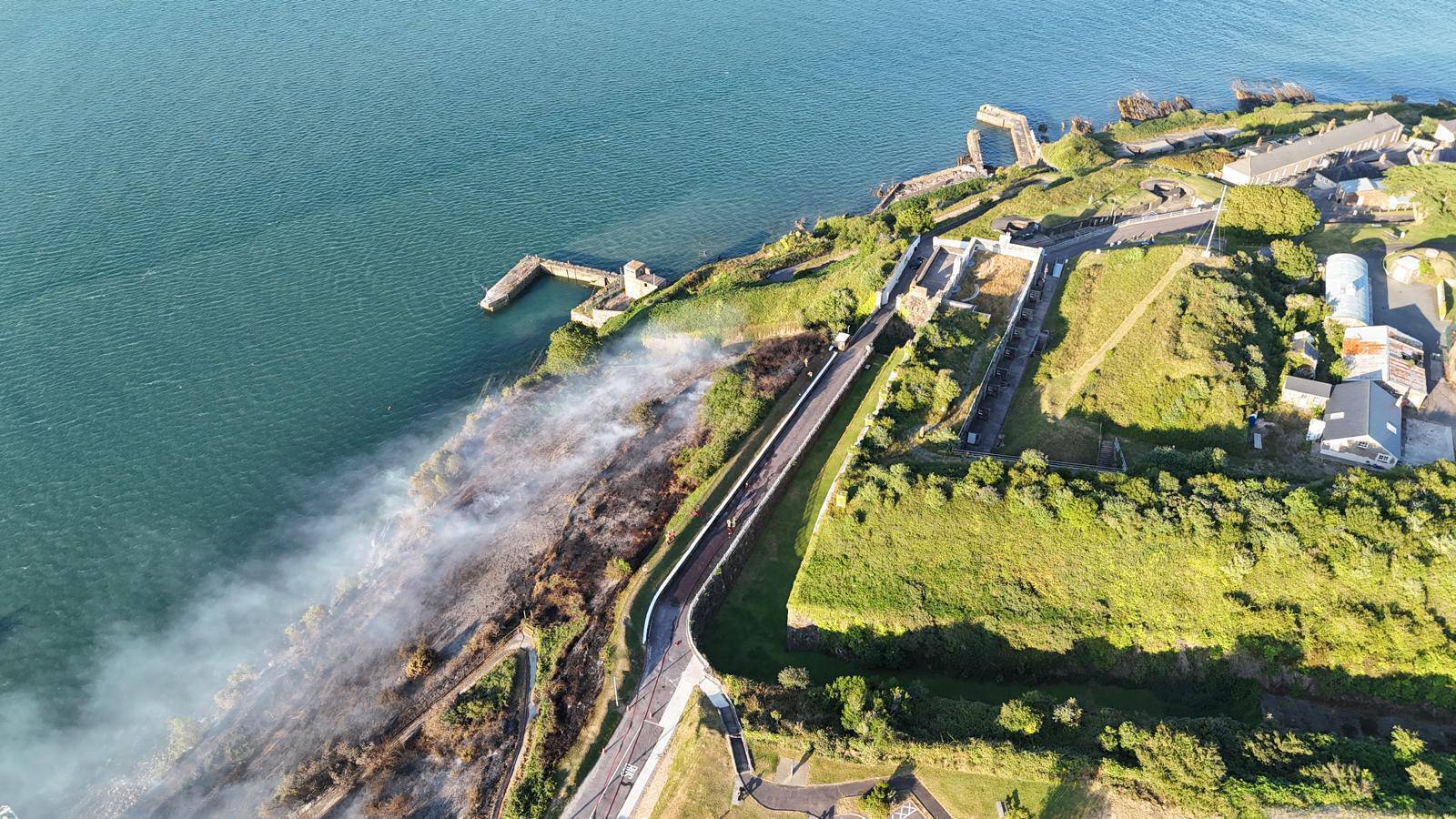 The blaze, which started on Monday evening, rapidly engulfed 26,000sq ft of land near Camden Fort Meagher in Crosshaven. 