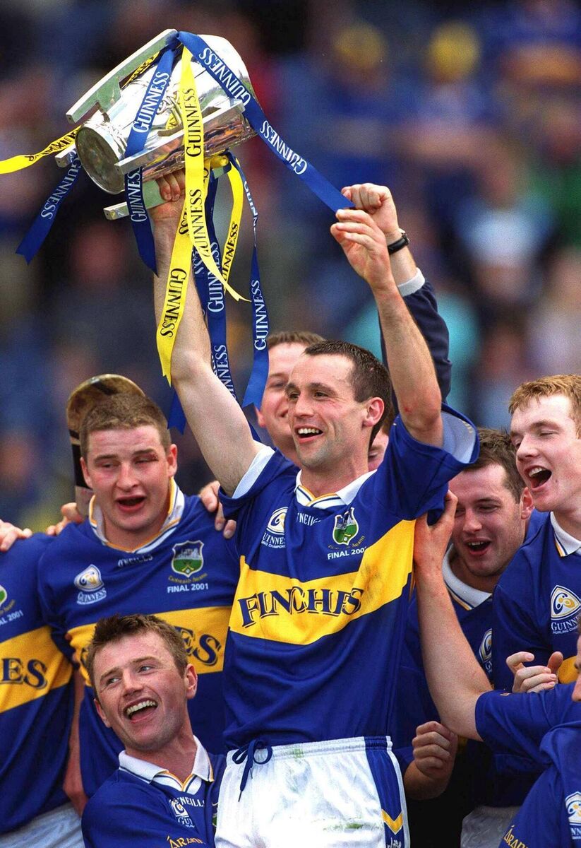 2001: Tipperary's Thomas Dunne lifts the Liam MacCarthy Cup after victory over Galway. Ray McManus/Sportsfile