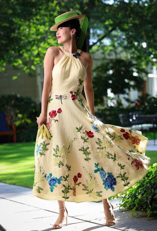 We love this Yellow linen dress with floral applique designed by Liza Brennan of Phoenix V