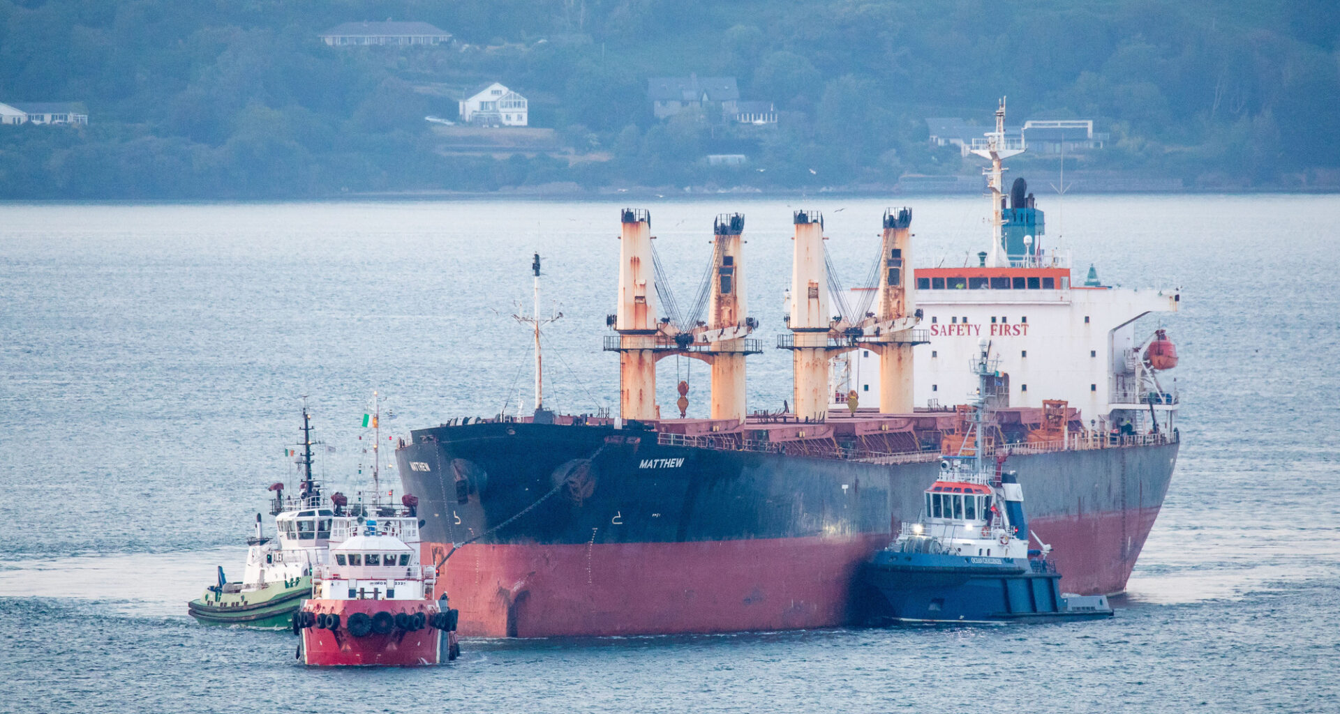 The MV Matthew, escorted by tugs Foteni, Ocean Challanger, Alex and Titan, is seen leaving Cork Harbour after almost three years tied up at the port since her seizure in September 2023. Picture: David Creedon