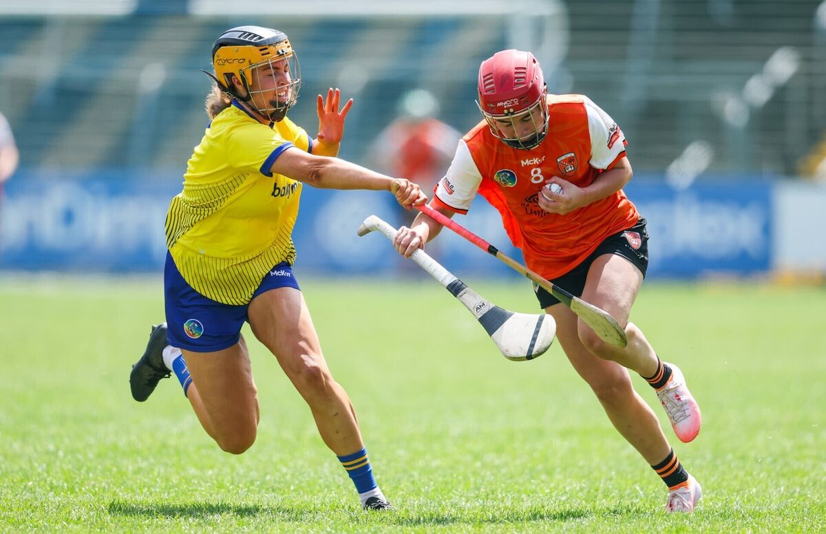 Armagh’s Katie Convie is hunted down by Sinéad Mannion of Roscommon. Pic: Nick Elliott/Inpho