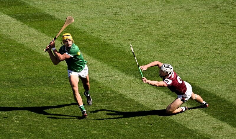 Cathal O'Neill of Limerick in action against Daithí Burke of Galway. Pic: Daire Brennan/Sportsfile