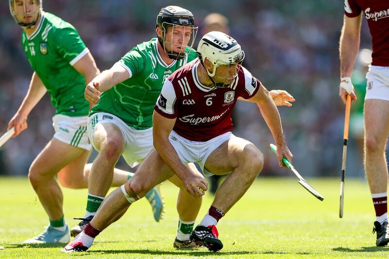Galway's Daithí Burke in action against Limerick's Peter Casey. Pic: ©INPHO/James Crombie