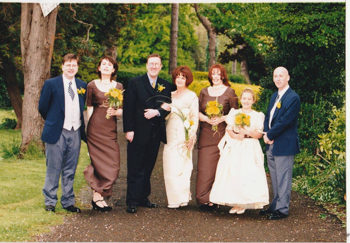 Teresa Mannion, her husband Dave, and their wedding party on their wedding day. 