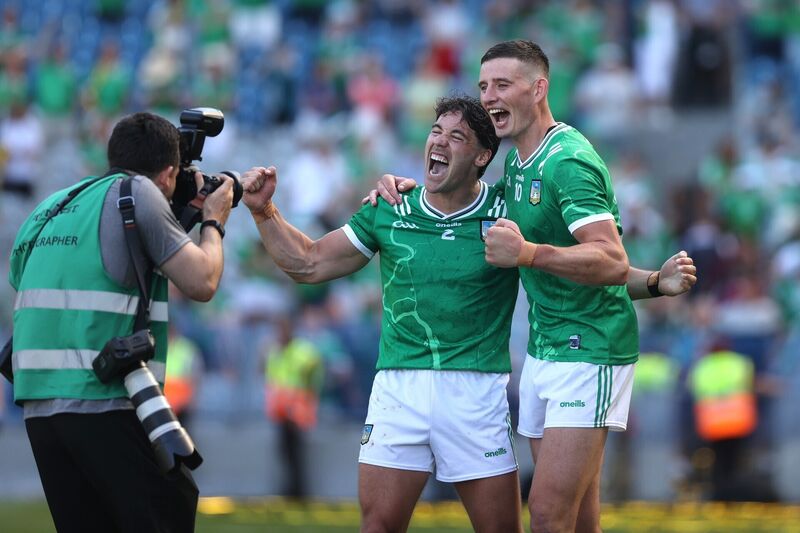 Sean Finn and Hegarty celebrate after the whistle.