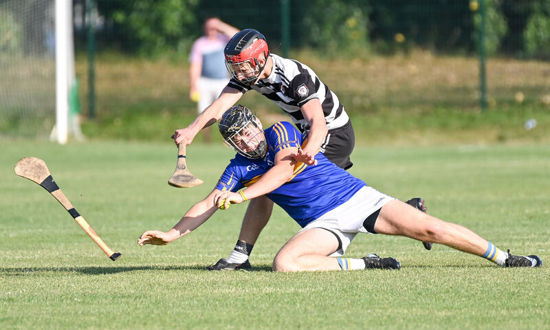  Carrigtwohill's John O'Connor is fouled by Midleton's Alex Molumby during their Premier 1 MHC clash in Midleton. Picture: David Keane.