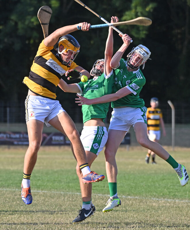 Na Piarsaigh's Jack Cahalane tussles with Ballincollig's Eanna Lynch and Joe Miskella under the dropping ball. Picture: Eddie O'Hare