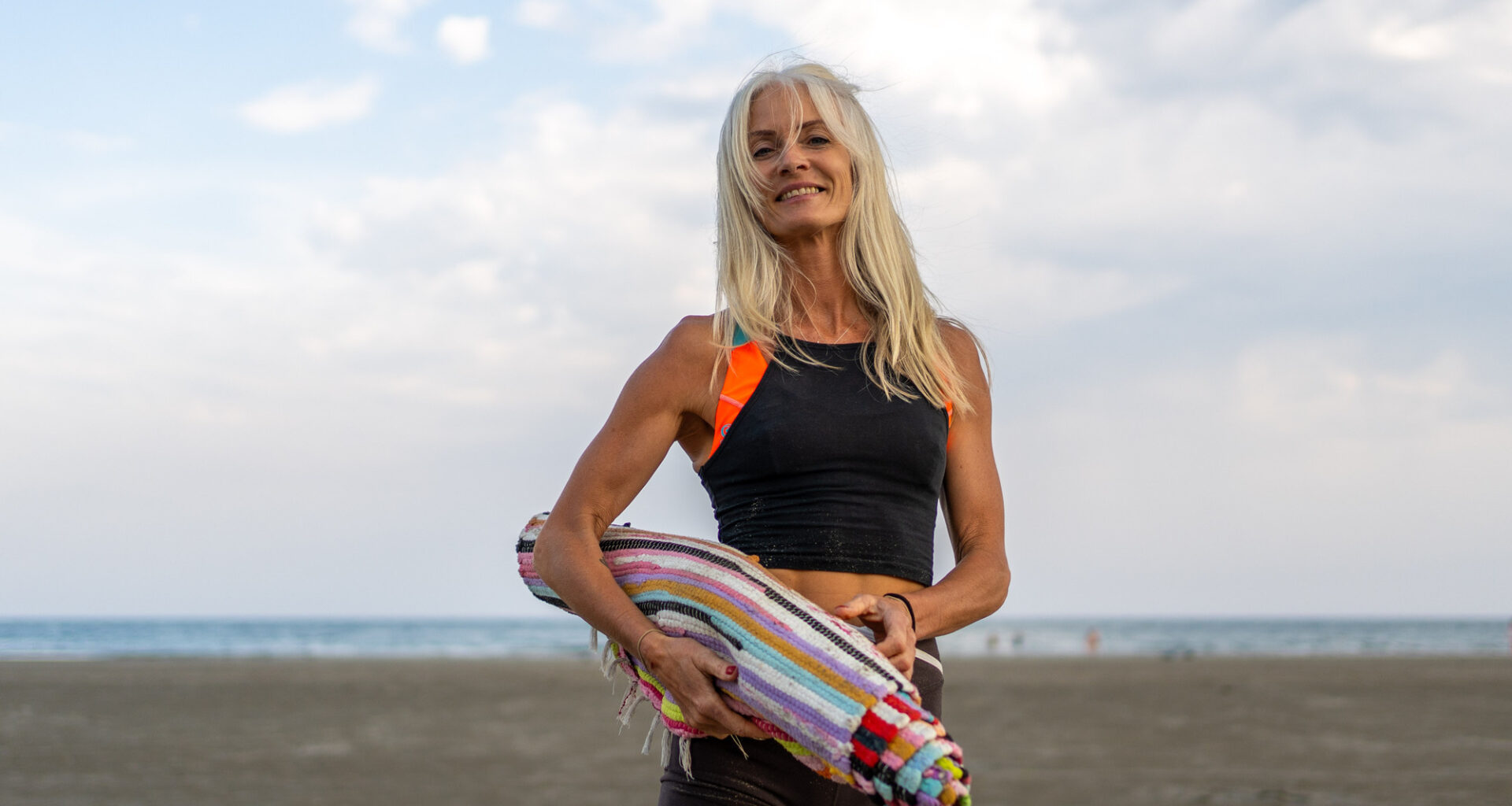 Odette Norman's yoga classes run four times a week, offering a pressure-free environment and expansive sea views. Picture: Noel Sweeney