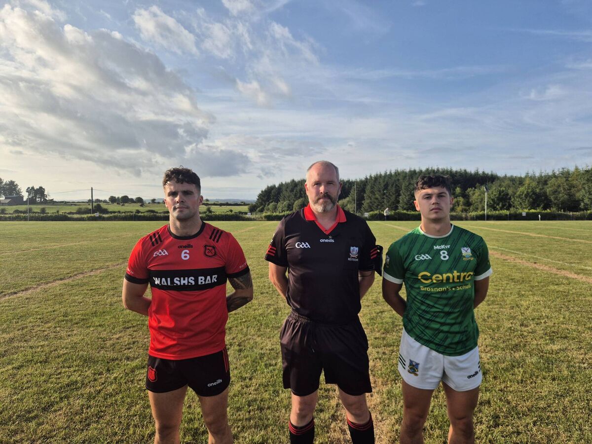 Mitchelstown captain Ronan Murphy, referee John Enright, and Gabriel Rangers captain Killian O'Brien.