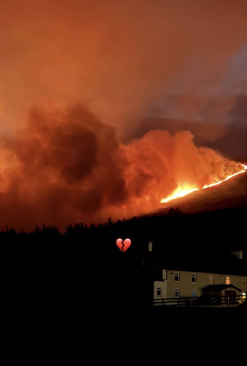 Flames and plumes of smoke from the wildfires on Slievenamon. Picture: Roz Purcell/Instagram
