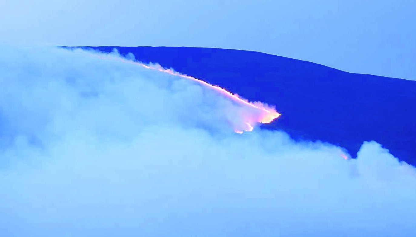 The wildfire on Slievenamon in Co Tipperary creeps in different directions as fire crews spent a fourth day tackling the major blaze. 	Picture: Eamonn Farrell/RollingNews