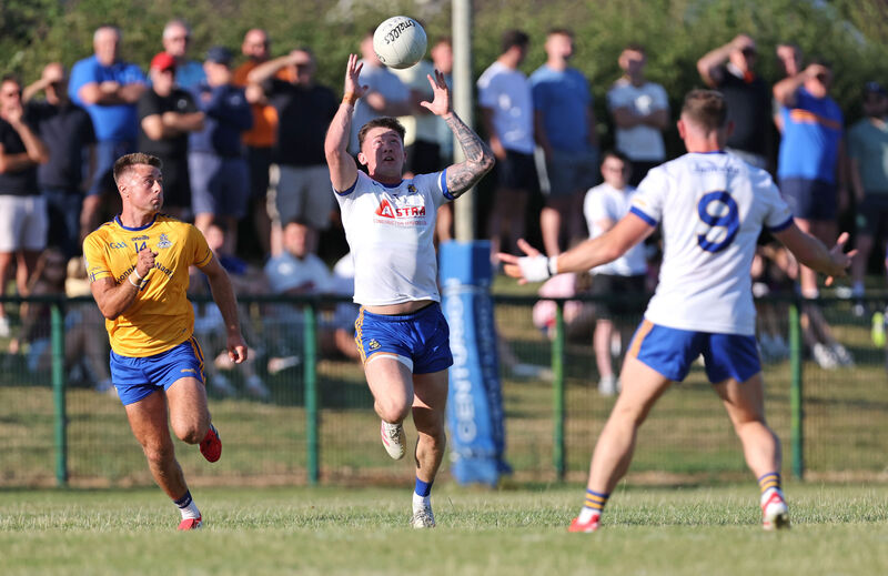  William Buckley, St. Finbarrs, Callum Barrett, Carrigaline.  2026 McCarthy Insurance Group Premier Senior Football Championship, St.Finbarrs V's Carrigaline, at Ballinhassig, Co. Cork.