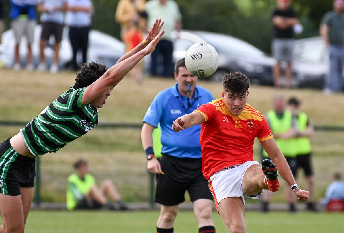  Mallow's Mark Tobin scores a point past Douglas' David Buckley during their Premier SFC clash at Grenagh. Picture: David Keane.
