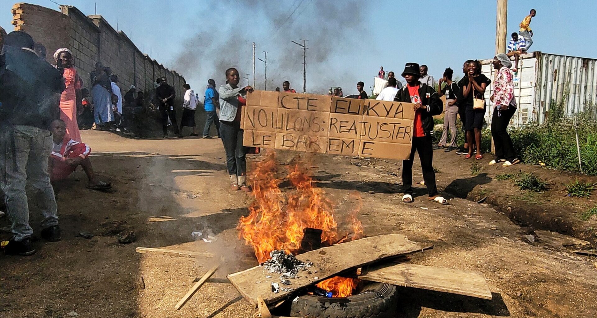 Rubble set on fire as health and frontline workers protest at the Elikya Ebola Treatment Centre in Bunia, Congo (Constant Same Bagalwa/AP)