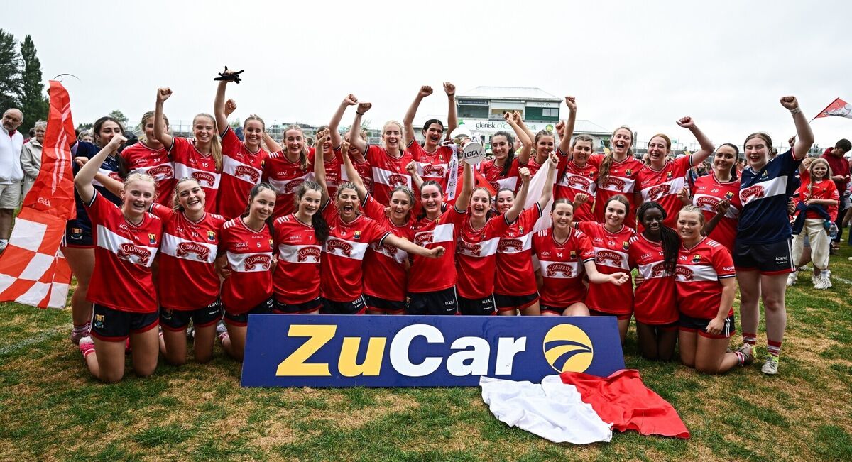 25 July 2026; Cork players celebrate with the trophy after their side's victory in the LGFA ZuCar All-Ireland U18A Championship final match between Cork and Roscommon at Glenisk O’Connor Park in Tullamore, Offaly. Photo by Seb Daly/Sportsfile