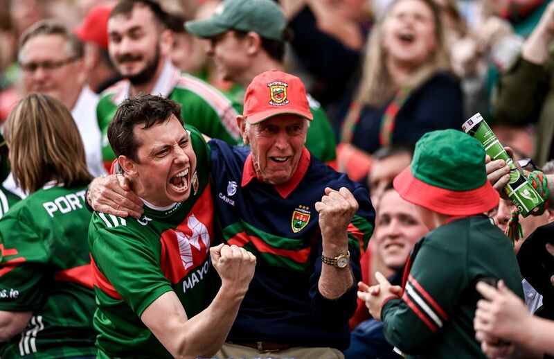 Mayo supporters celebrate their side's first goal. Pic: 