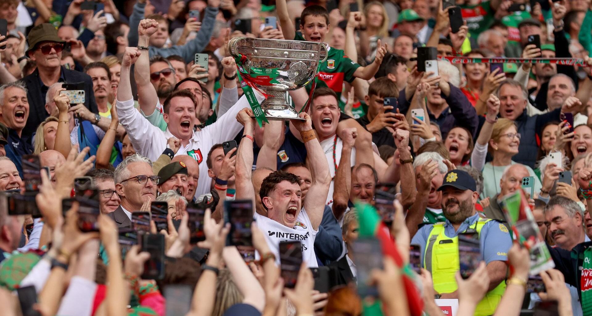 Mayo's Jack Coyne lifts the Sam Maguire Cup. Pic: INPHO/Tom Maher