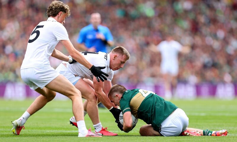 Kerry's Dylan Casey is tackled by Mayo's Ryan O'Donoghue and Sam Callinan. Pic: ©INPHO/Tom O’Hanlon