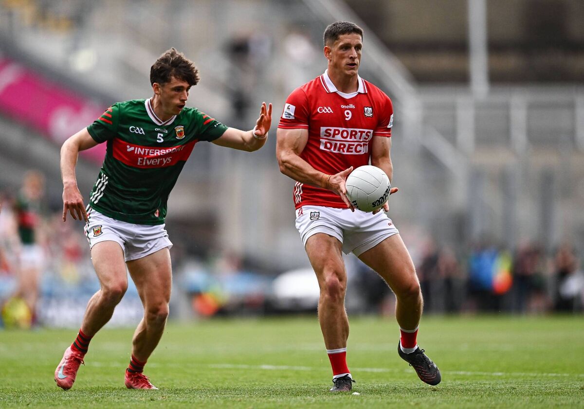 Colm O'Callaghan of Cork in action against Sam Callinan of Mayo. Picture: Ben McShane/Sportsfile