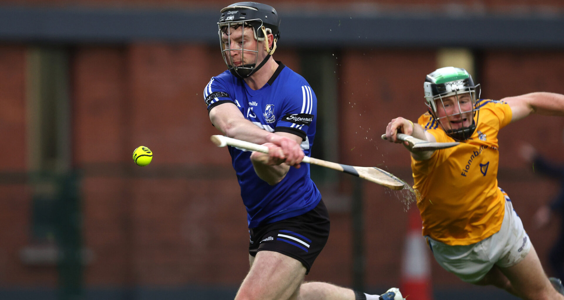 HUNTING FOR MORE: Sean Daly of St. Finbarr's fails to stop Jack O'Connor of Sarsfields. Pic: Jim Coughlan.