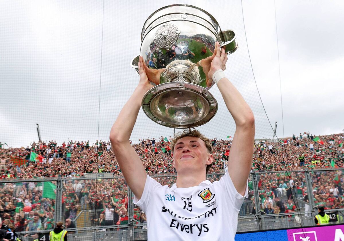 Mayo's Kobe McDonald celebrates with the Sam Maguire Cup. Picture: Ryan Byrne/INPHO